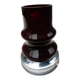 Red glass table lamp on a chrome base.