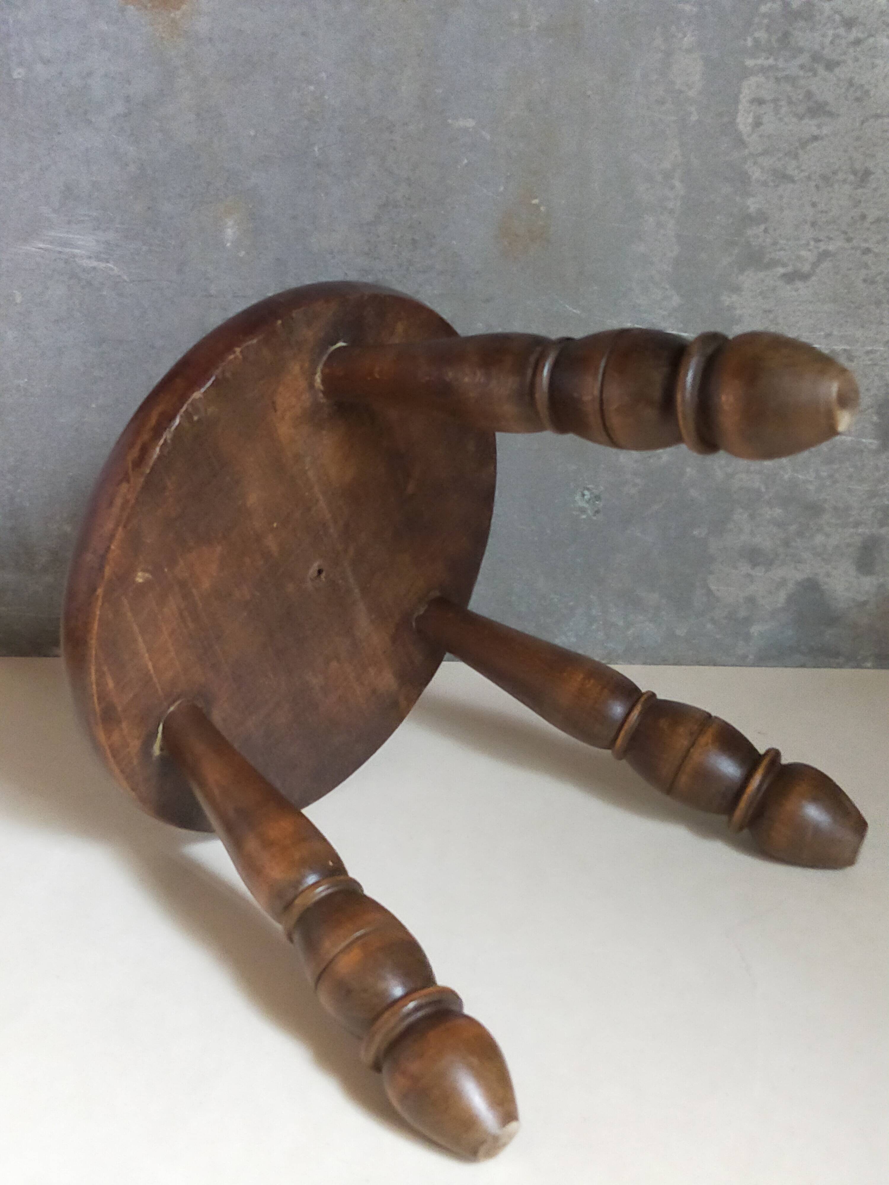 Low tripod stool in vintage turned solid wood