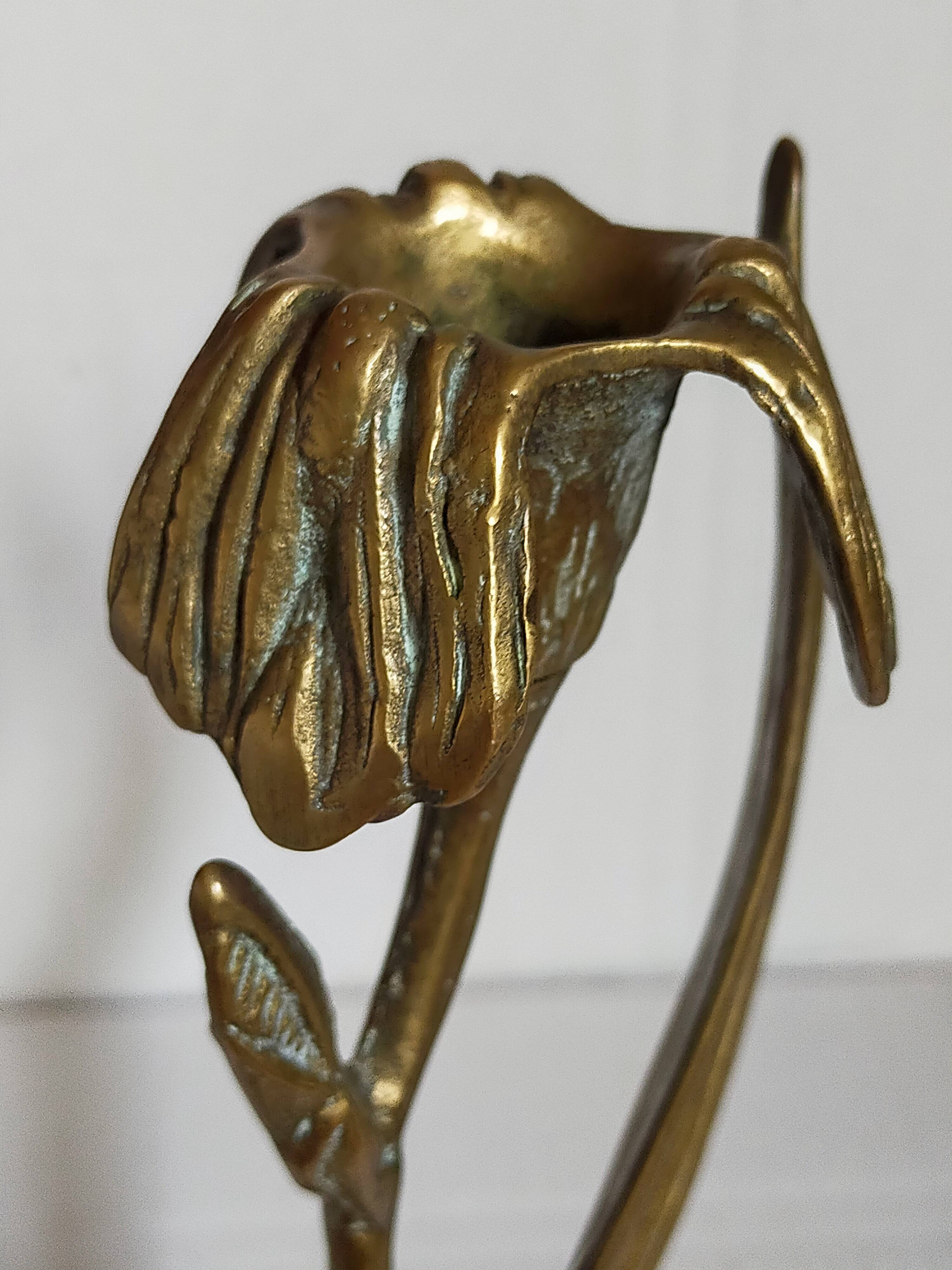 Old iris flower candle holder in solid brass