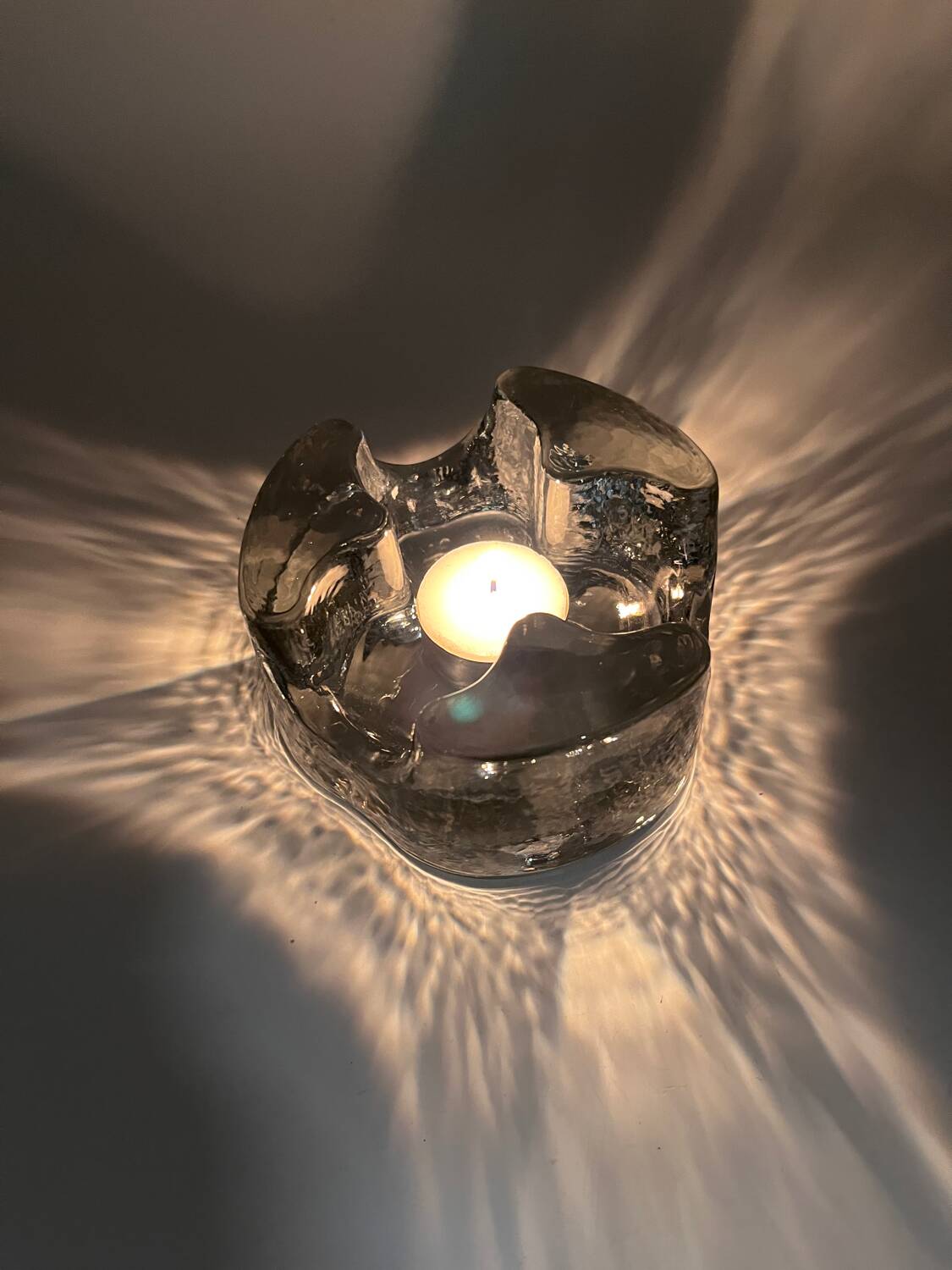 Solid glass candle holder