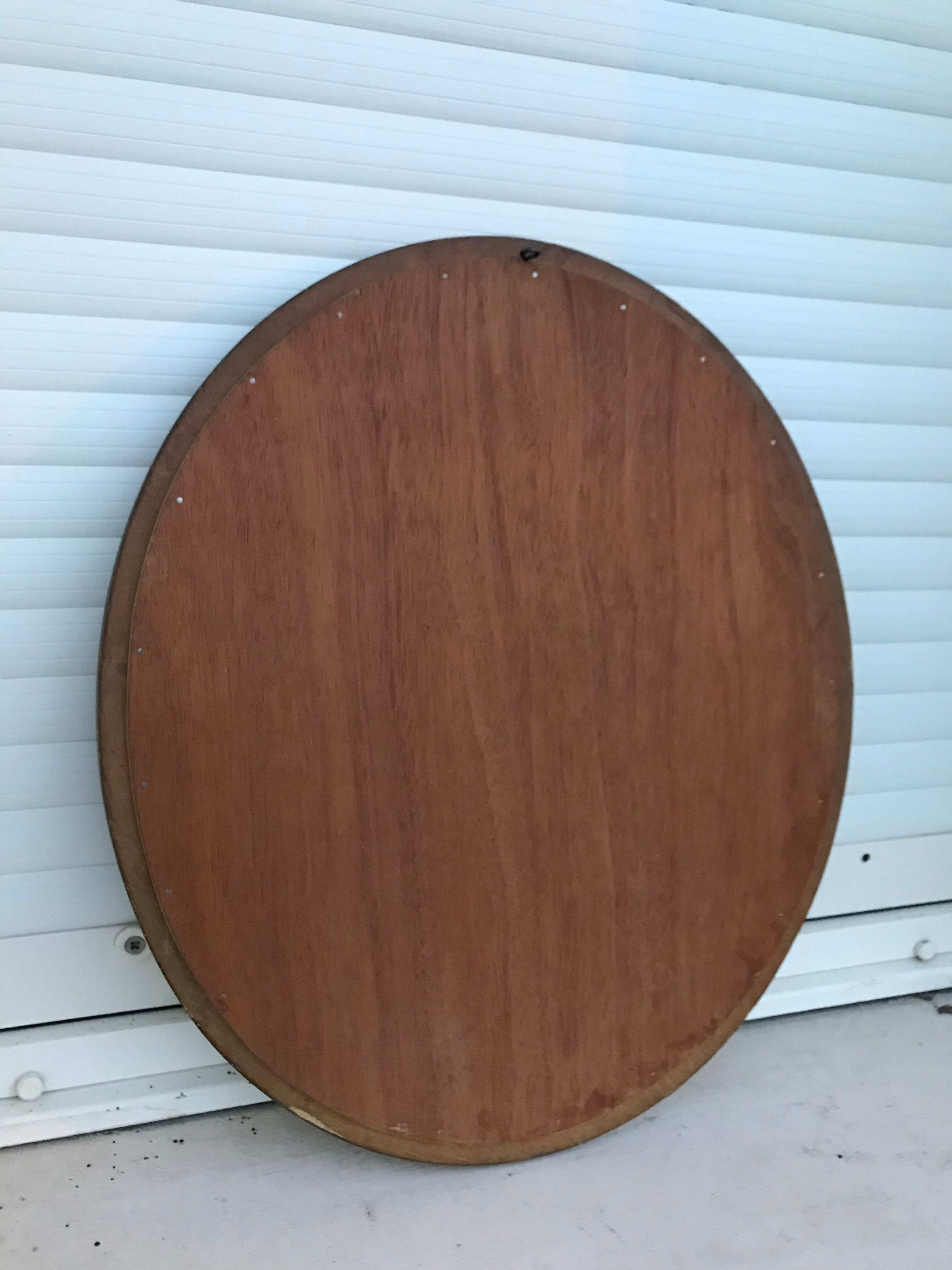 Miroir ovale bois doré 45x50cm