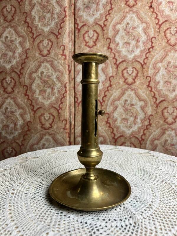 Gold-plated brass candlestick with push button