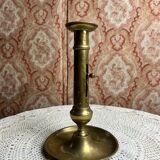 Gold-plated brass candlestick with push button