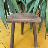 Old wooden tripod stool