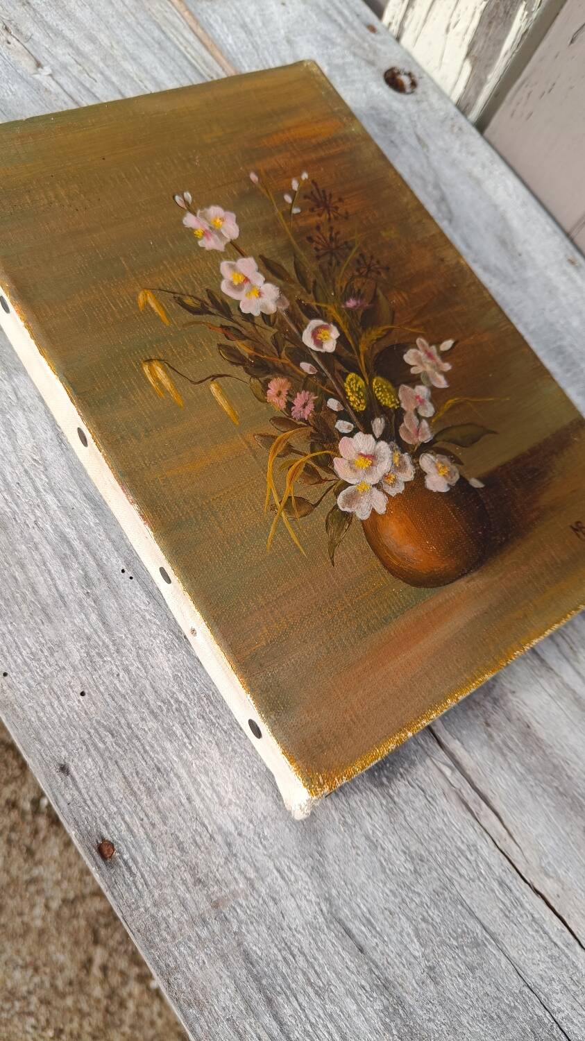 Canvas painting of a bouquet of flowers.