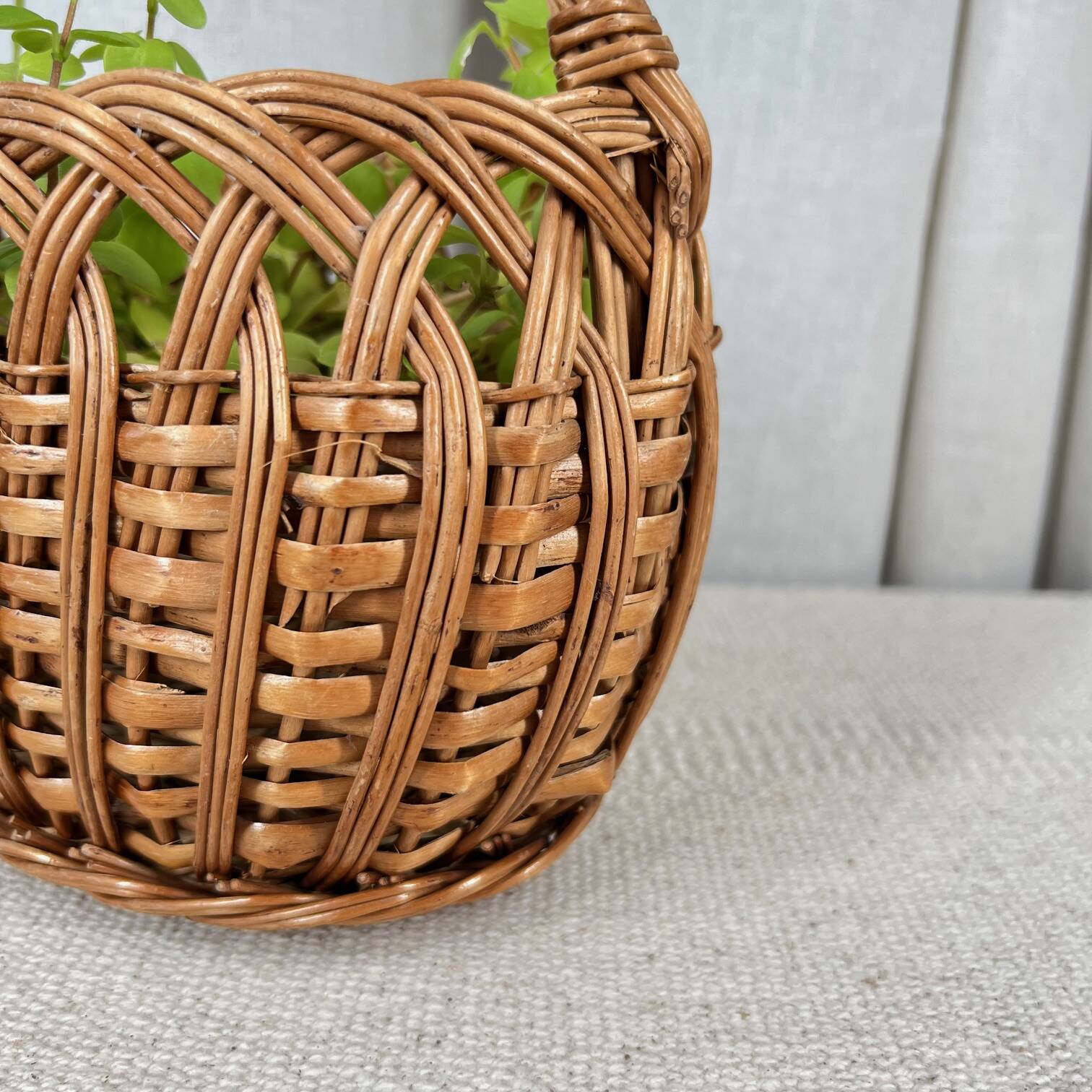 Small oval woven wicker basket