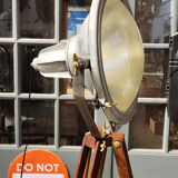 Industrial projector on tripod waxed wood