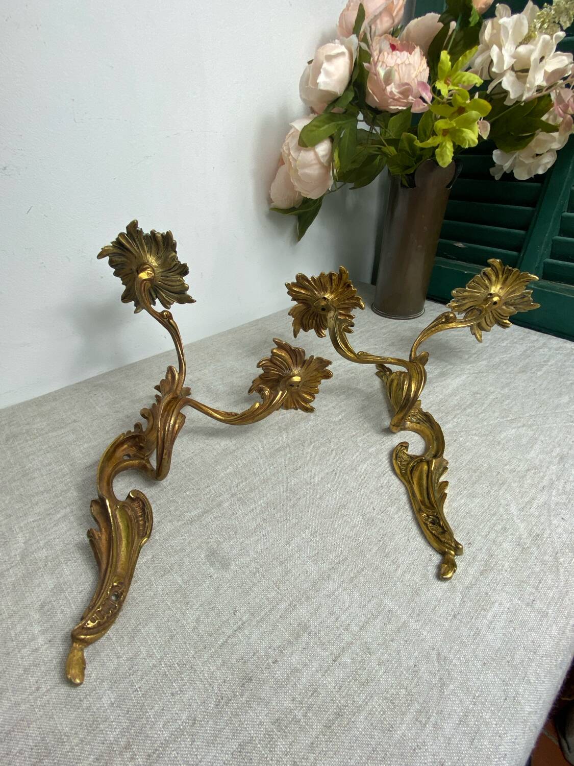 Two Louis XV style bronze wall candlesticks