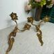 Two Louis XV style bronze wall candlesticks