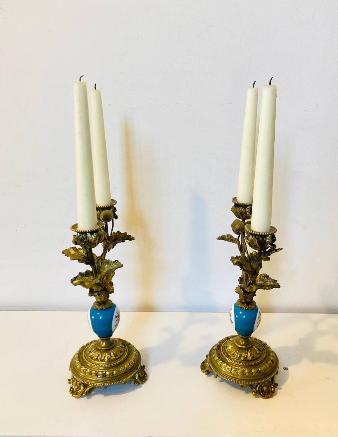 19th century candle holders in gilded bronze and porcelain