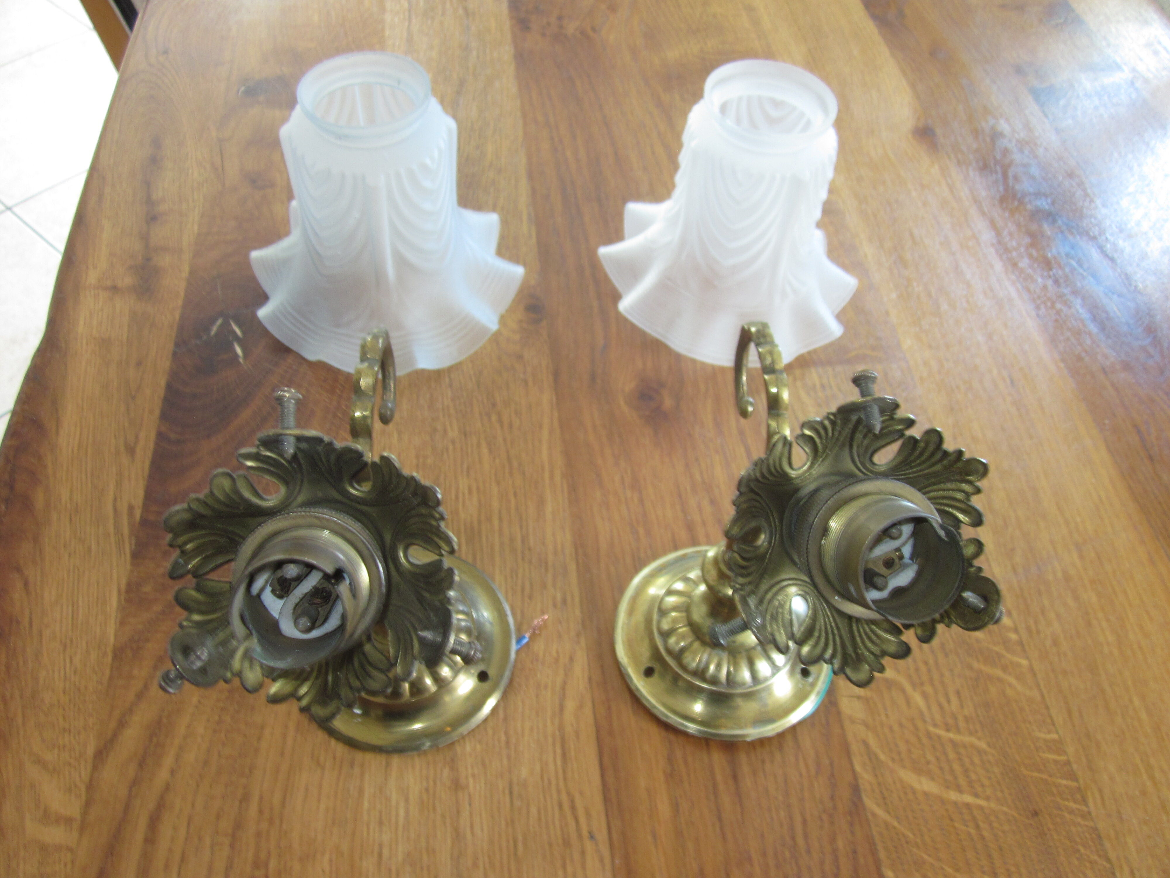 Pair of old bronze sconces