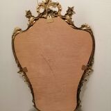 Miroir mural avec ornements dores patine