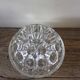 Large round glass flower frog vase with 19 holes.