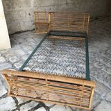 Twin rattan beds with built-in bedside tables