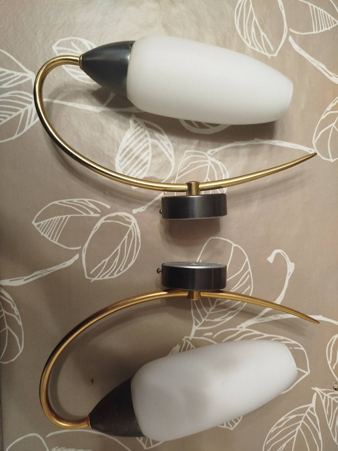 Minimalist wall sconces in opal white glass from the 1990s.