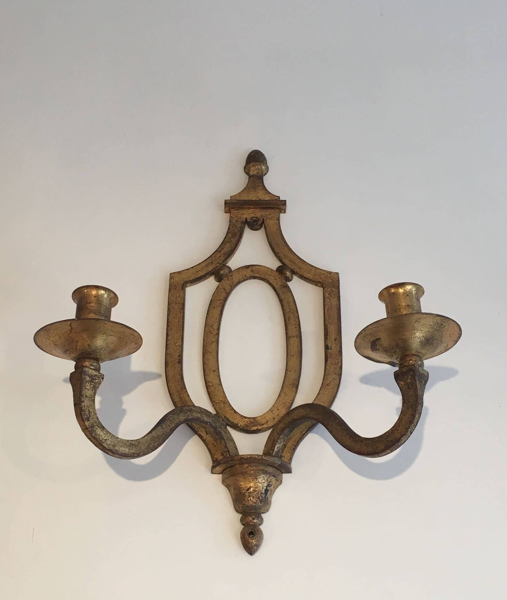 Golden Wrought Iron Wall Light with Oval Shield and Two Arms. French Work.