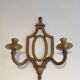 Golden Wrought Iron Wall Light with Oval Shield and Two Arms. French Work.
