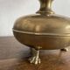 Antique brass lamp with embroidered openwork shade.