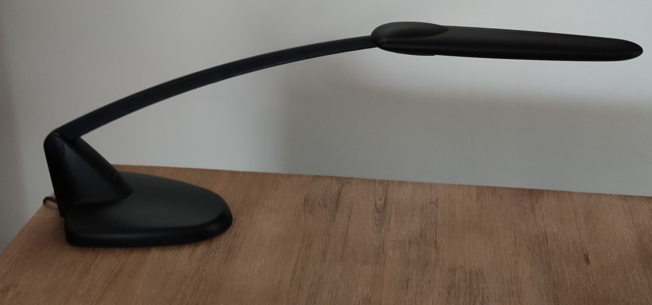 Black unilux workshop lamp with articulated arm