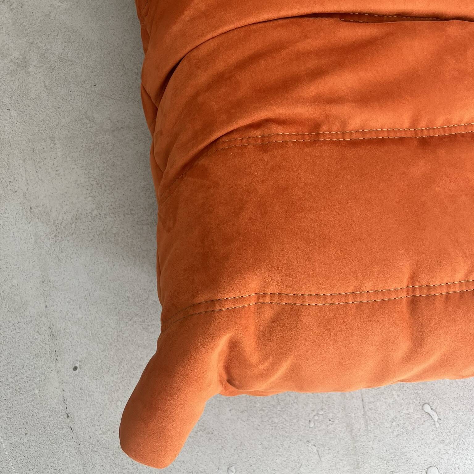 Orange Togo armchair by Michel Ducaroy for Ligne Roset, 1973.