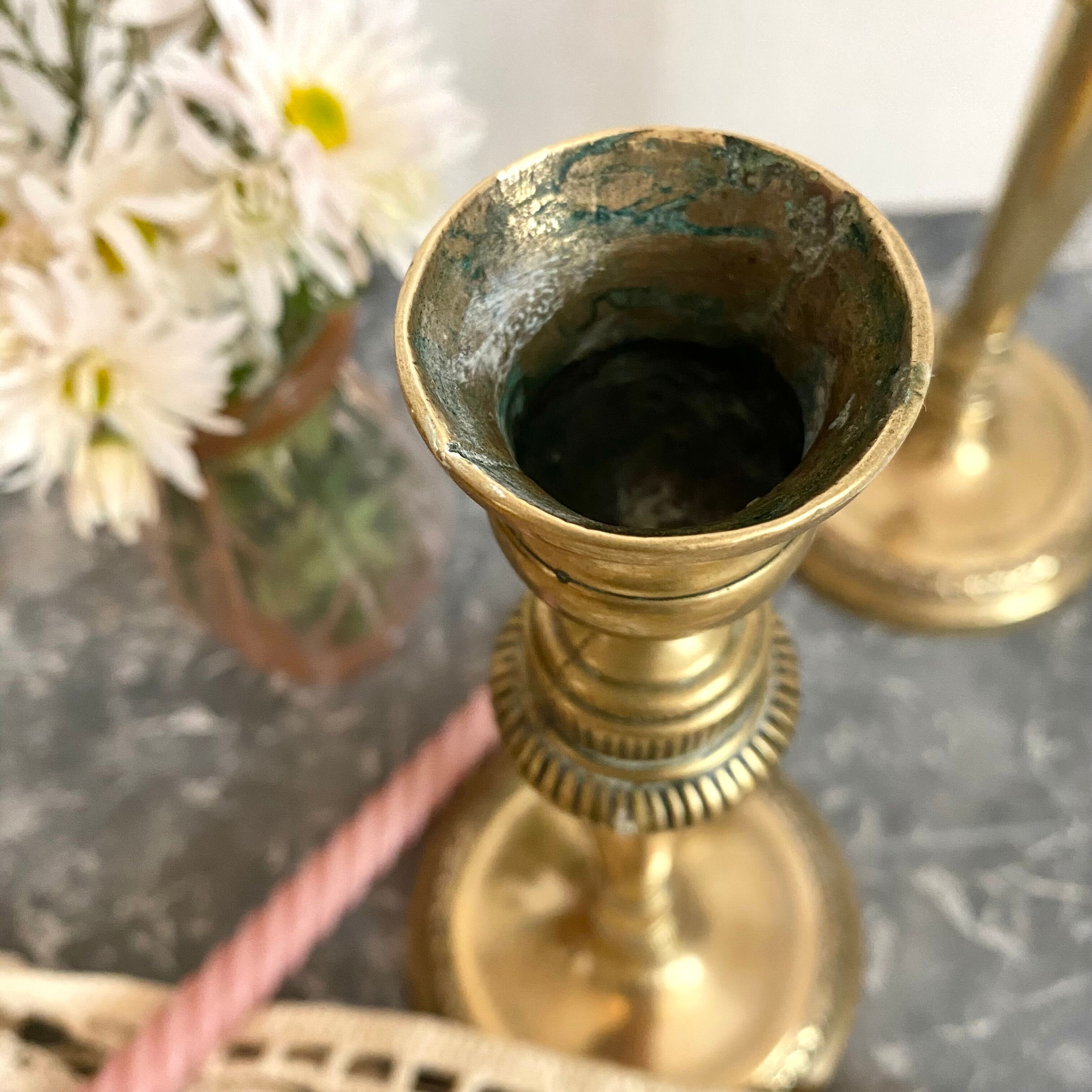 Pair of old gilded brass candlesticks