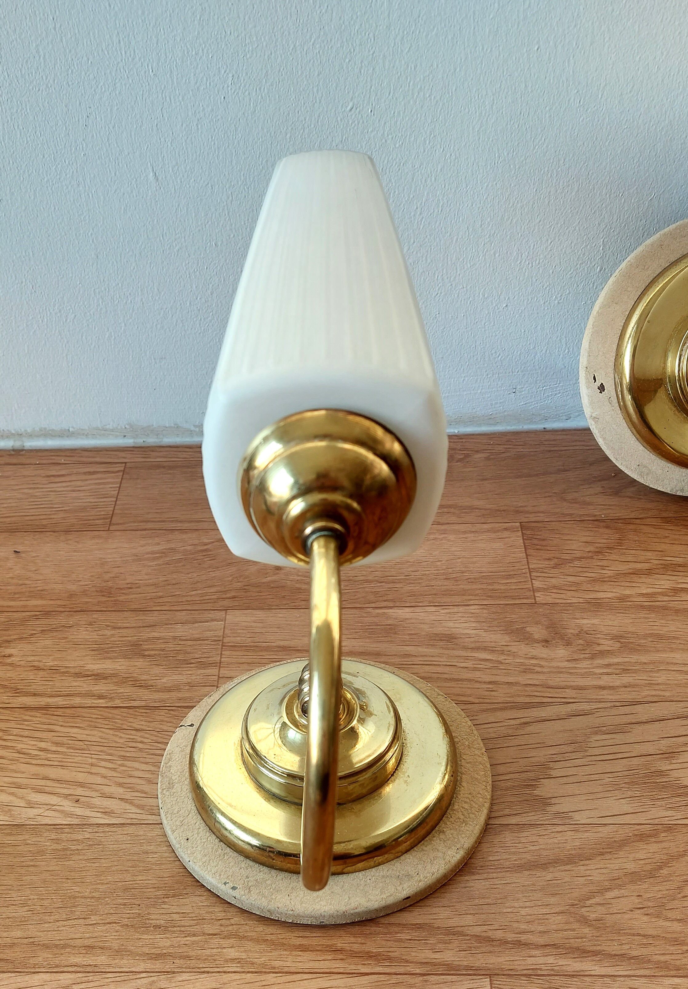 Pair of sconces with a light arm, brass and white opaline 1960.