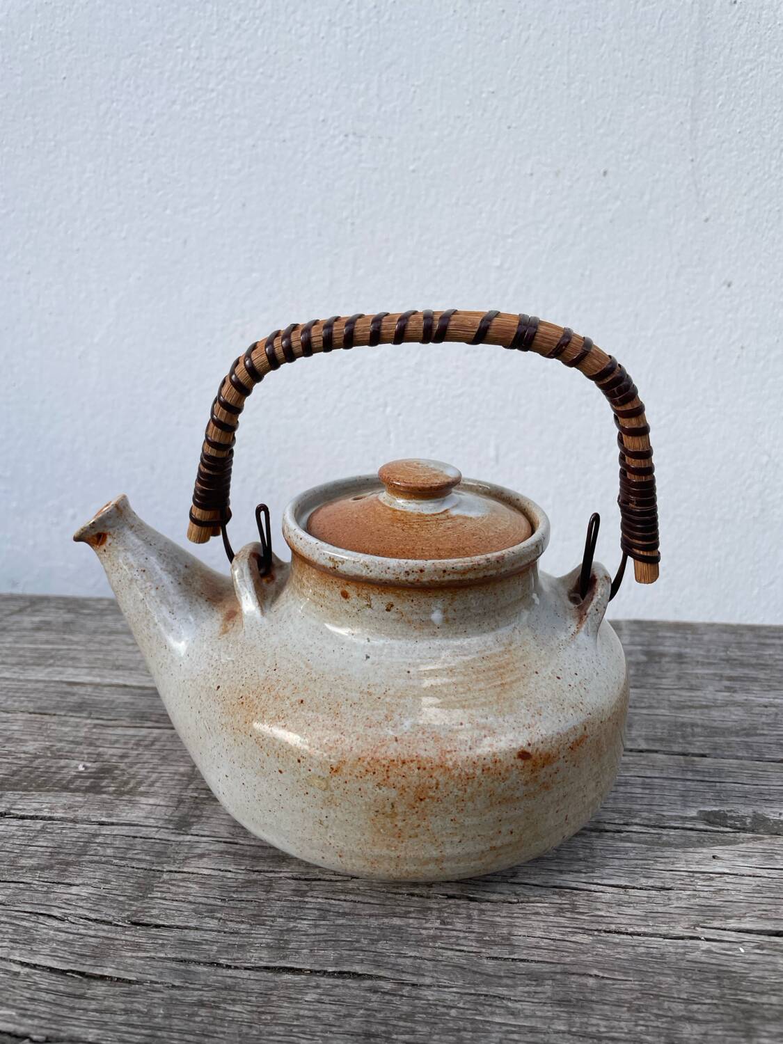 Grand Feu ceramic stoneware and rattan teapot