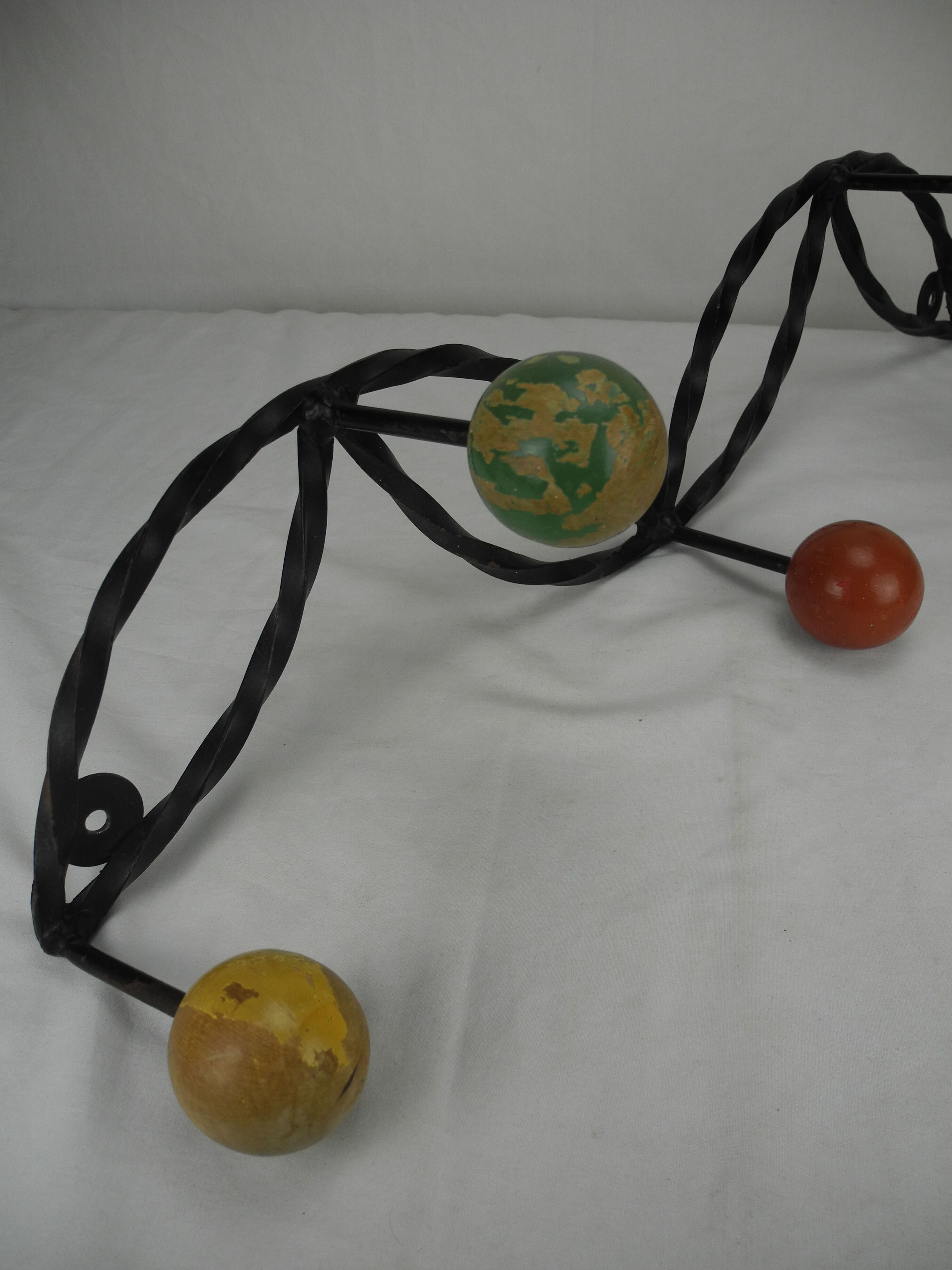 Old wrought iron coat rack