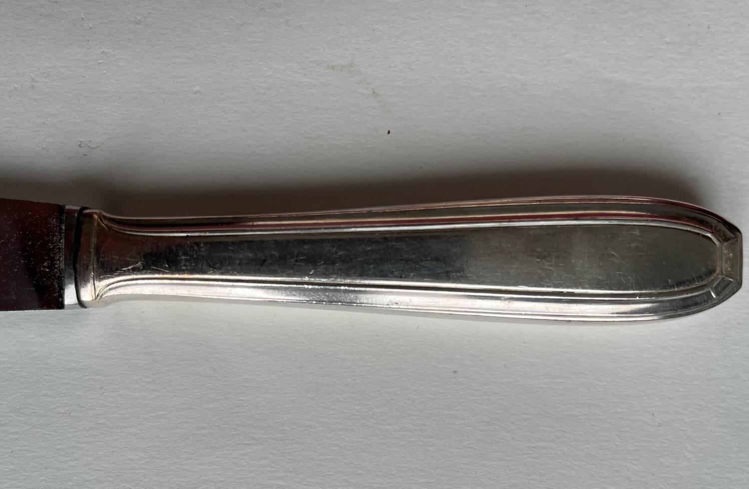 11 silver metal knives