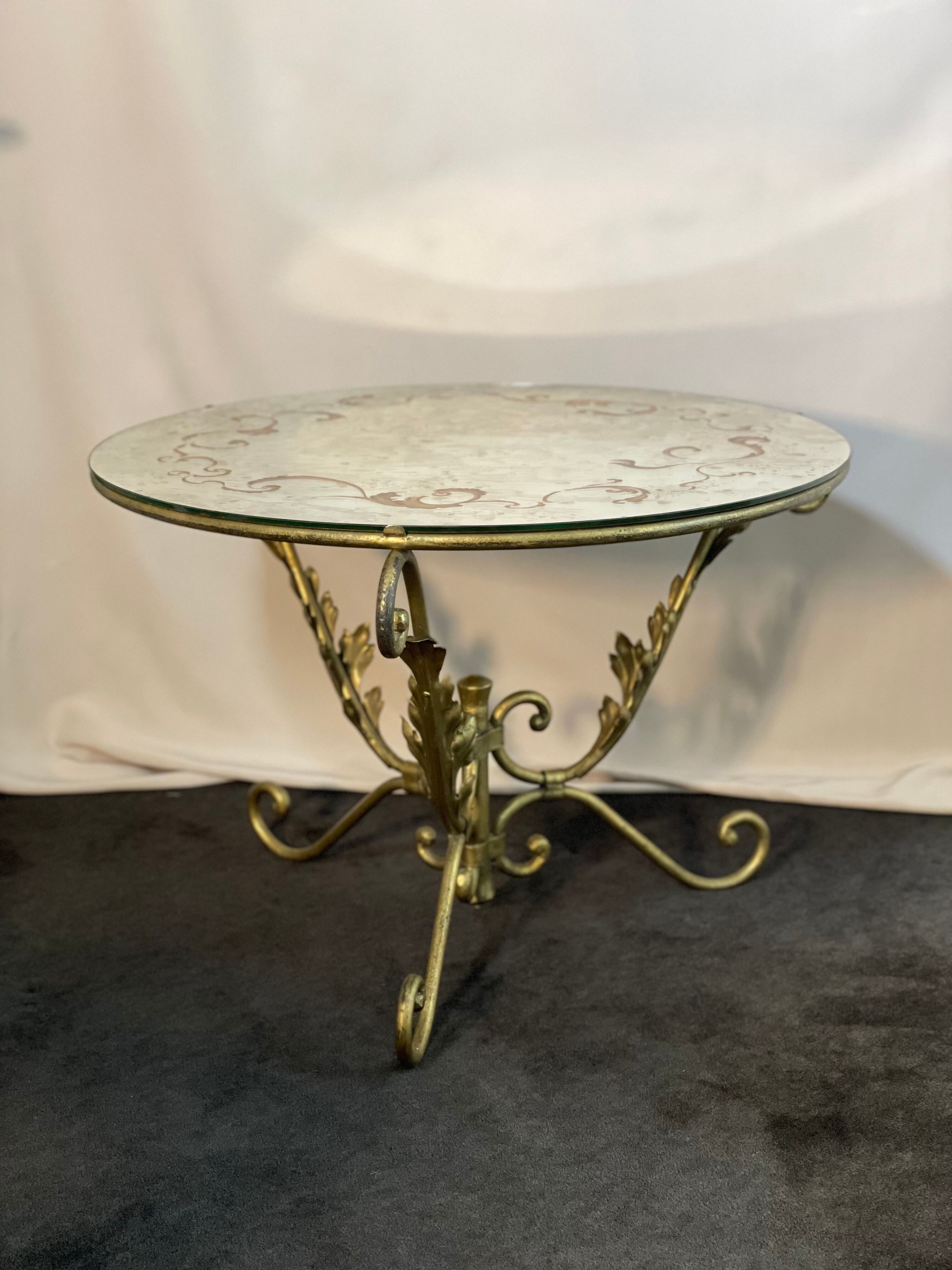 Round coffee table base in gilded wrought iron beautiful top enamelled glass 50s