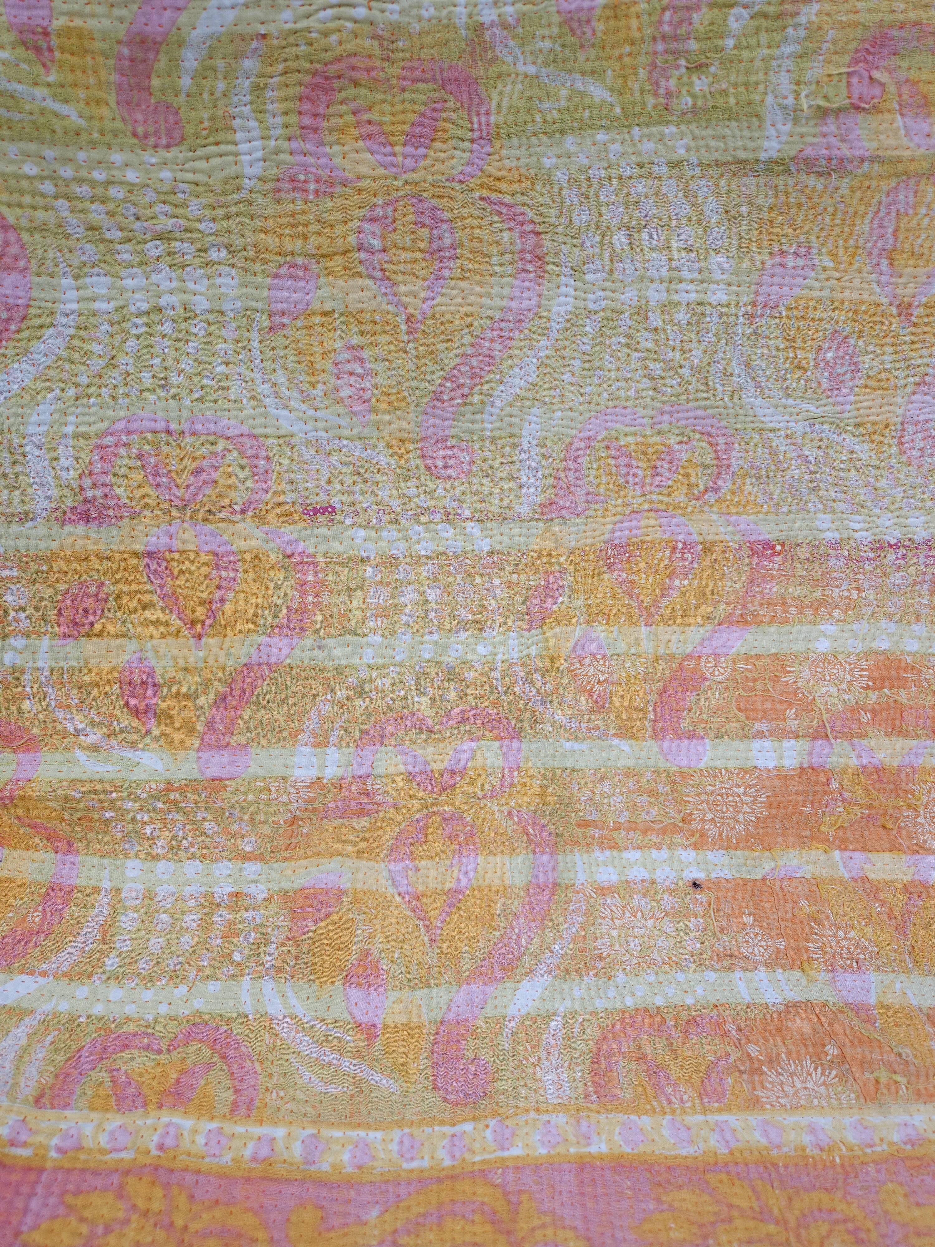 Fabric or plaid. old bed cover recycled and assembled worn deliberately