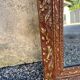 Antique mirror in patinated gilt wood