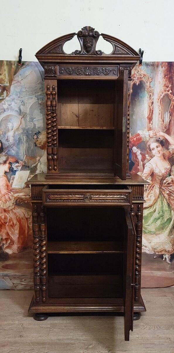 Antique solid walnut piece of furniture, finely carved, in Renaissance style.