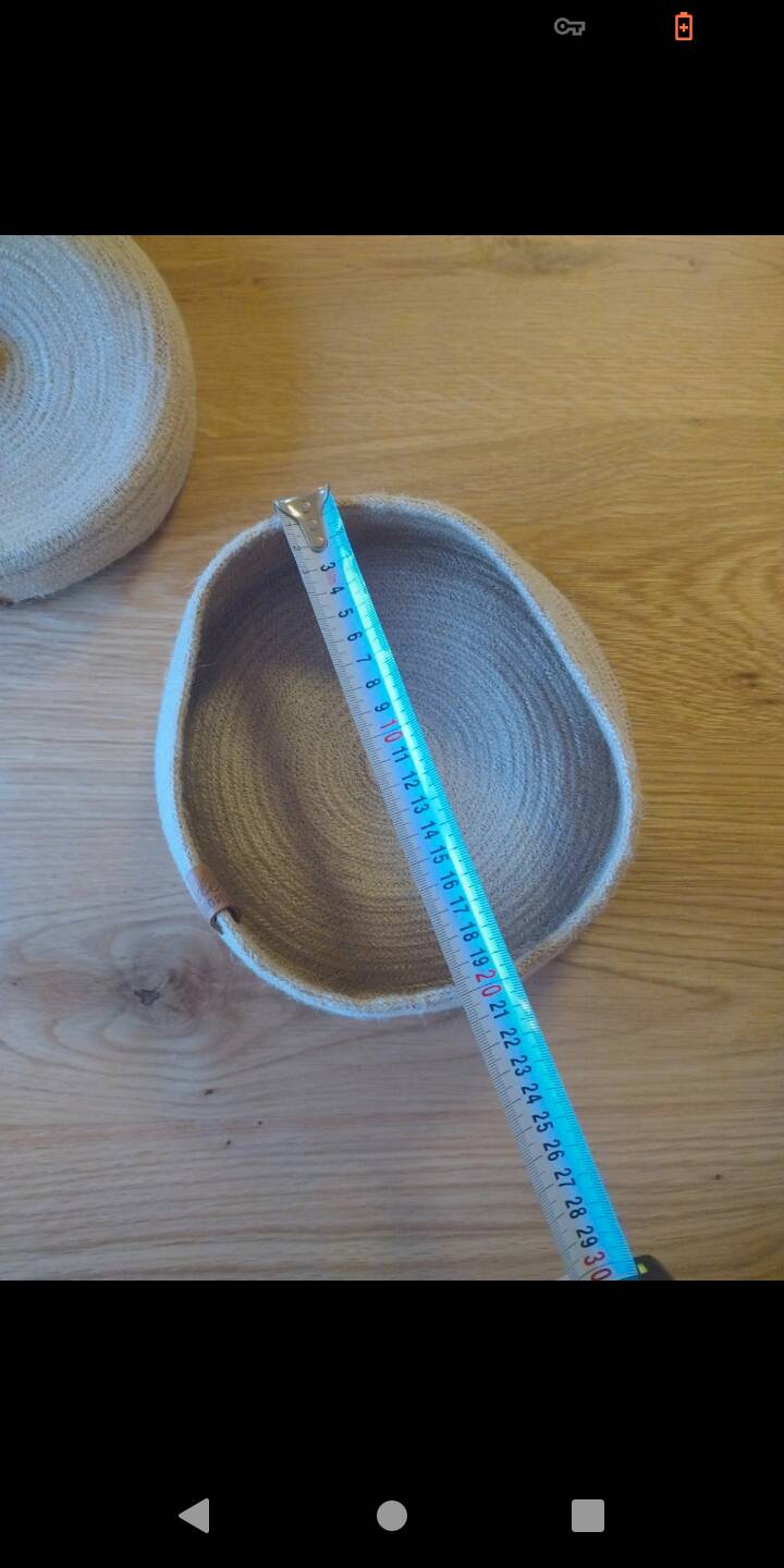 Basket with braided rope and leather lid