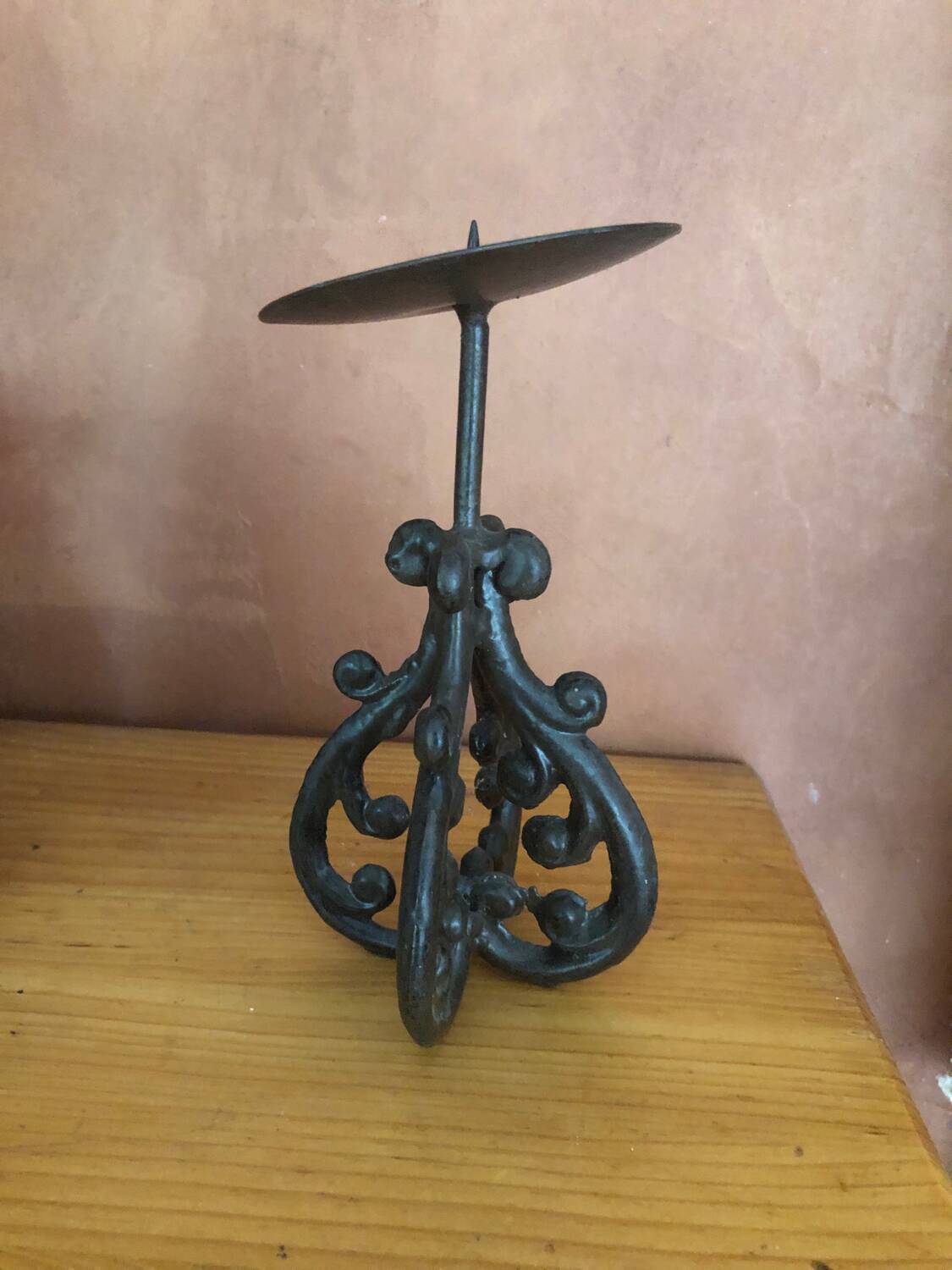 Cast iron candle holder