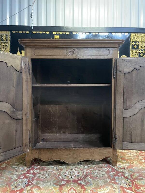 Louis XV period low cabinet in solid oak