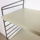 Swedish white shelves by Nisse Strinning for String of the 1960s