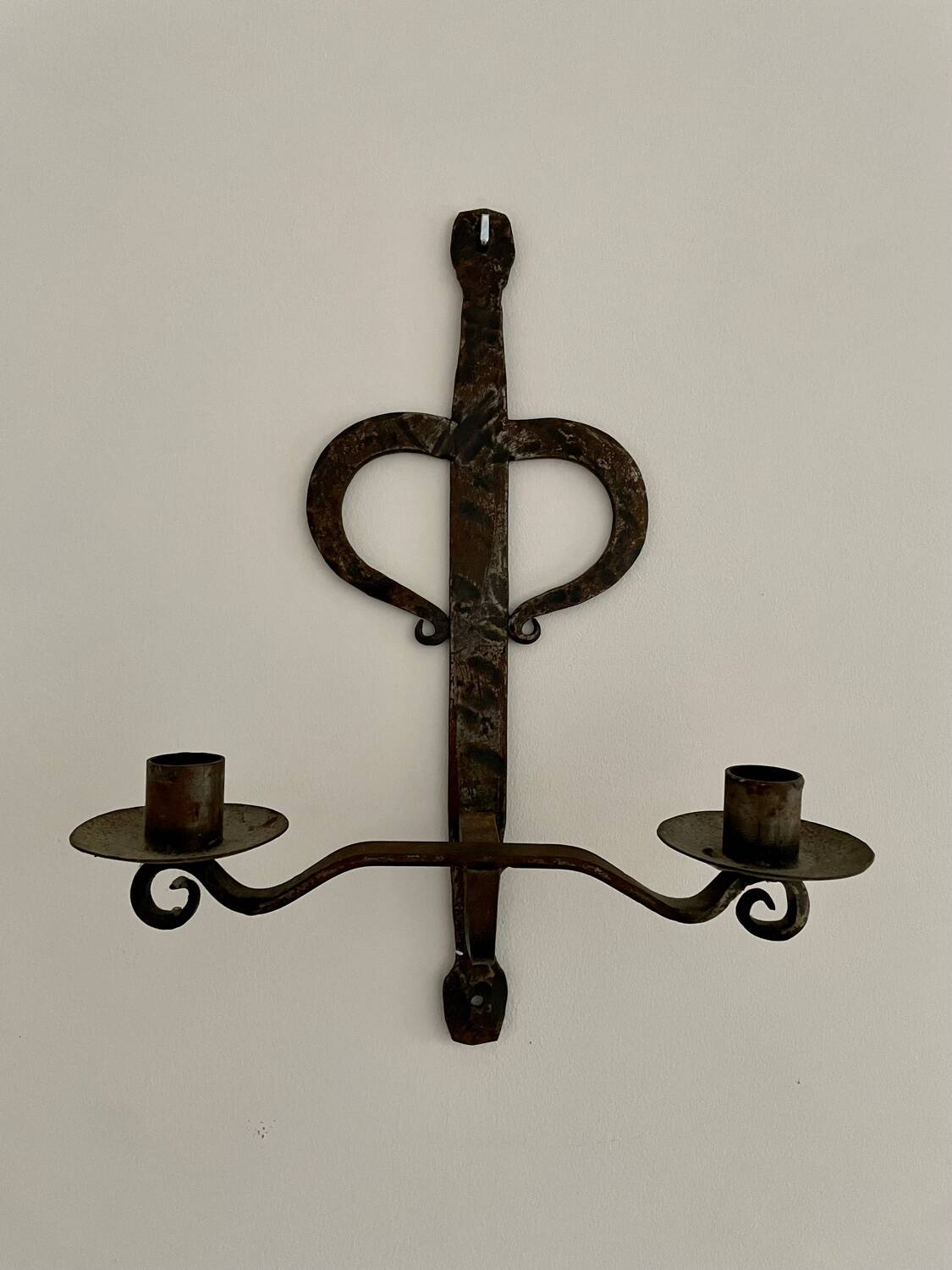 Brutalist wrought iron wall candle holder