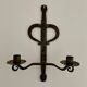 Brutalist wrought iron wall candle holder