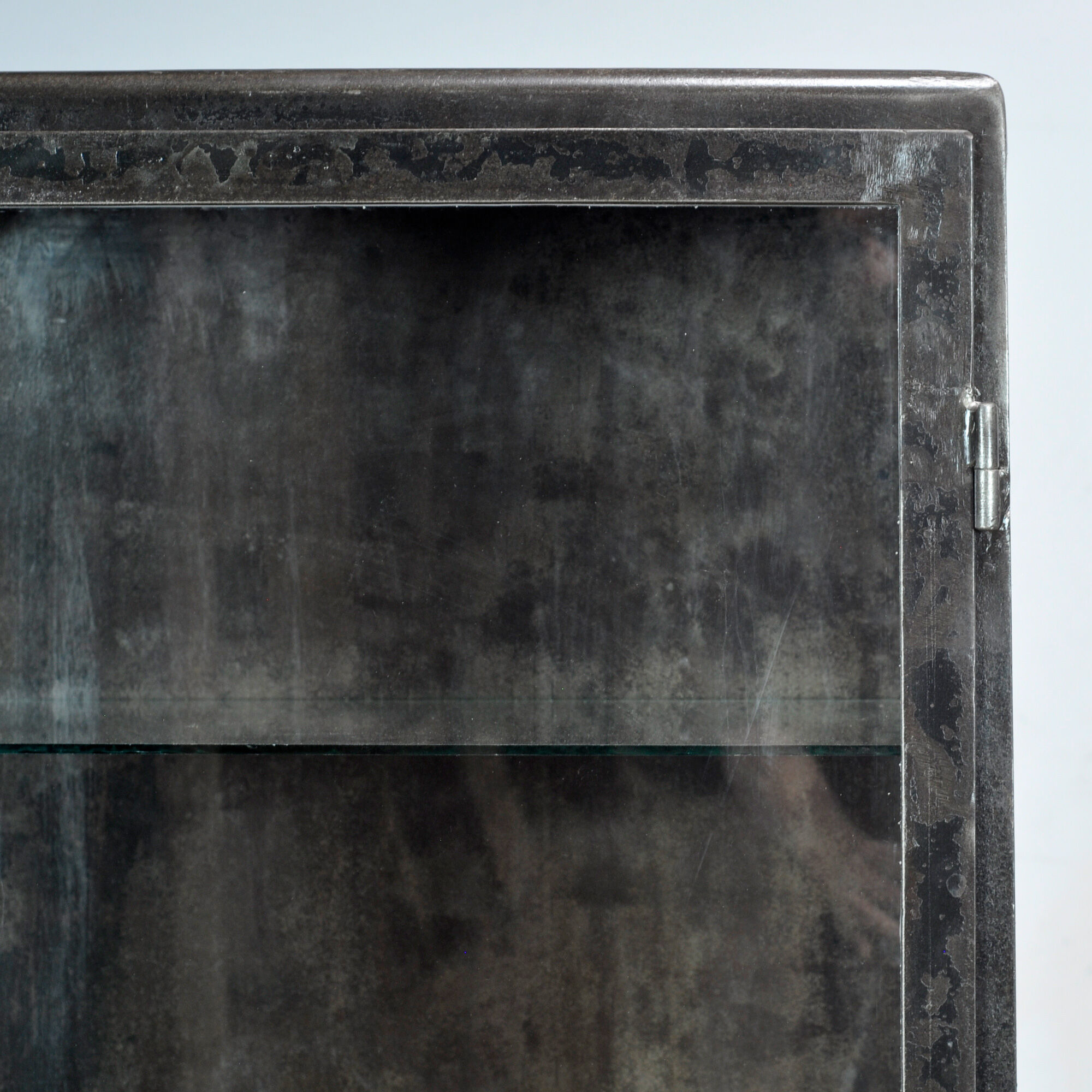 Polished iron medicine cabinet, 1920s