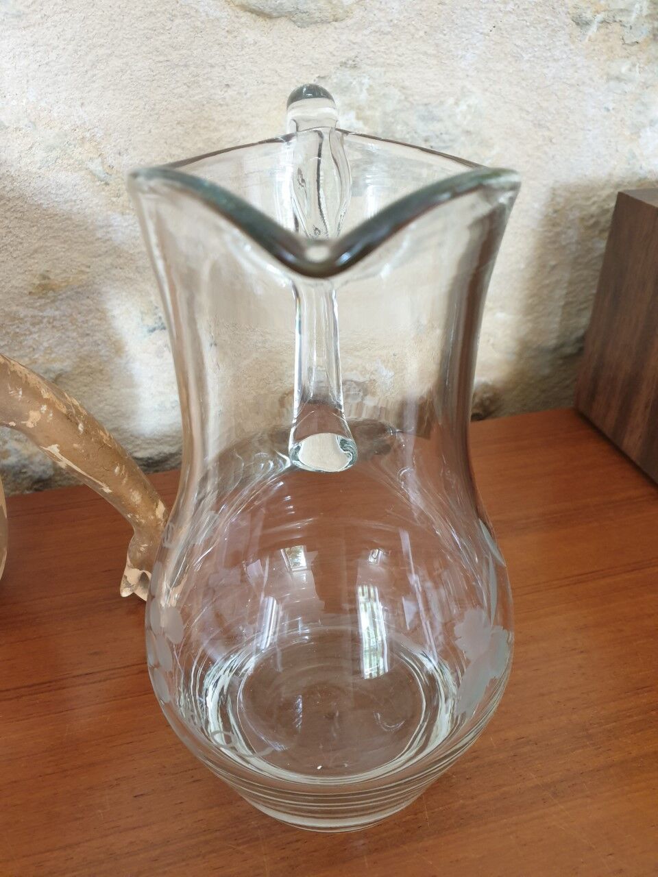 Pitcher decorating grape bunch