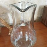 Pitcher decorating grape bunch