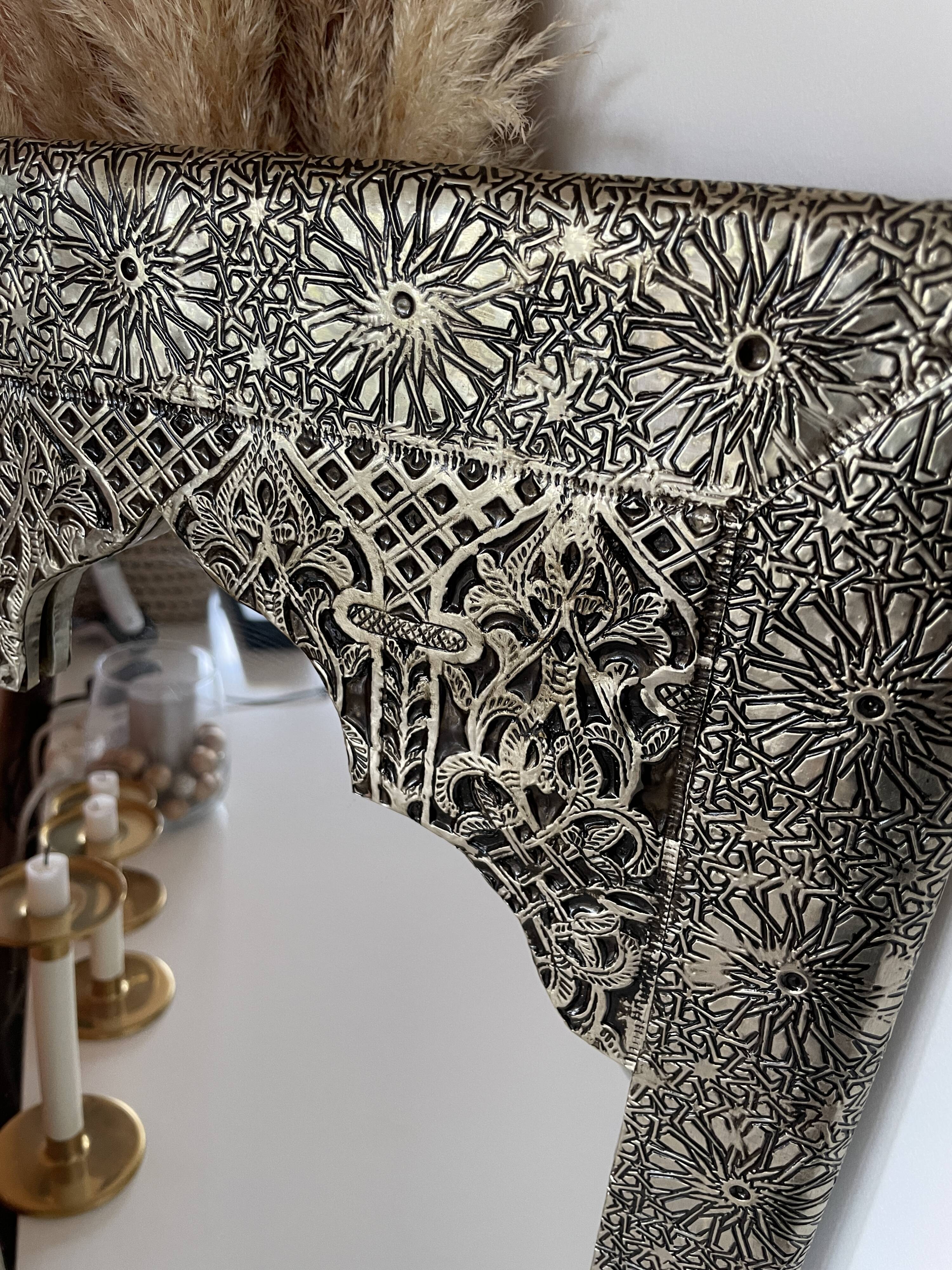 Silver oriental mirror