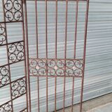 Screen partition wall made of glass and wrought iron