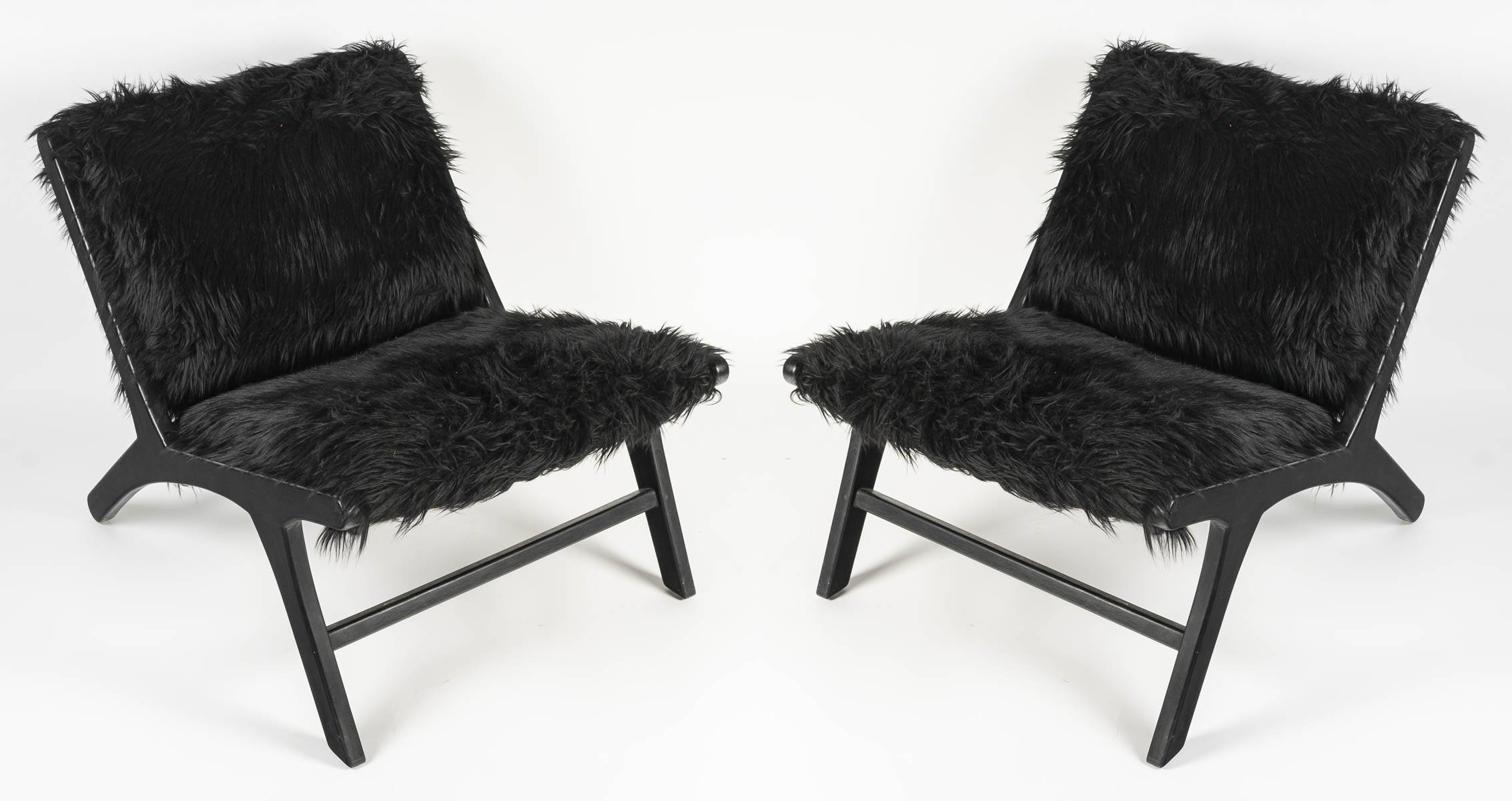 Pair of low chairs by olivier de schrijver