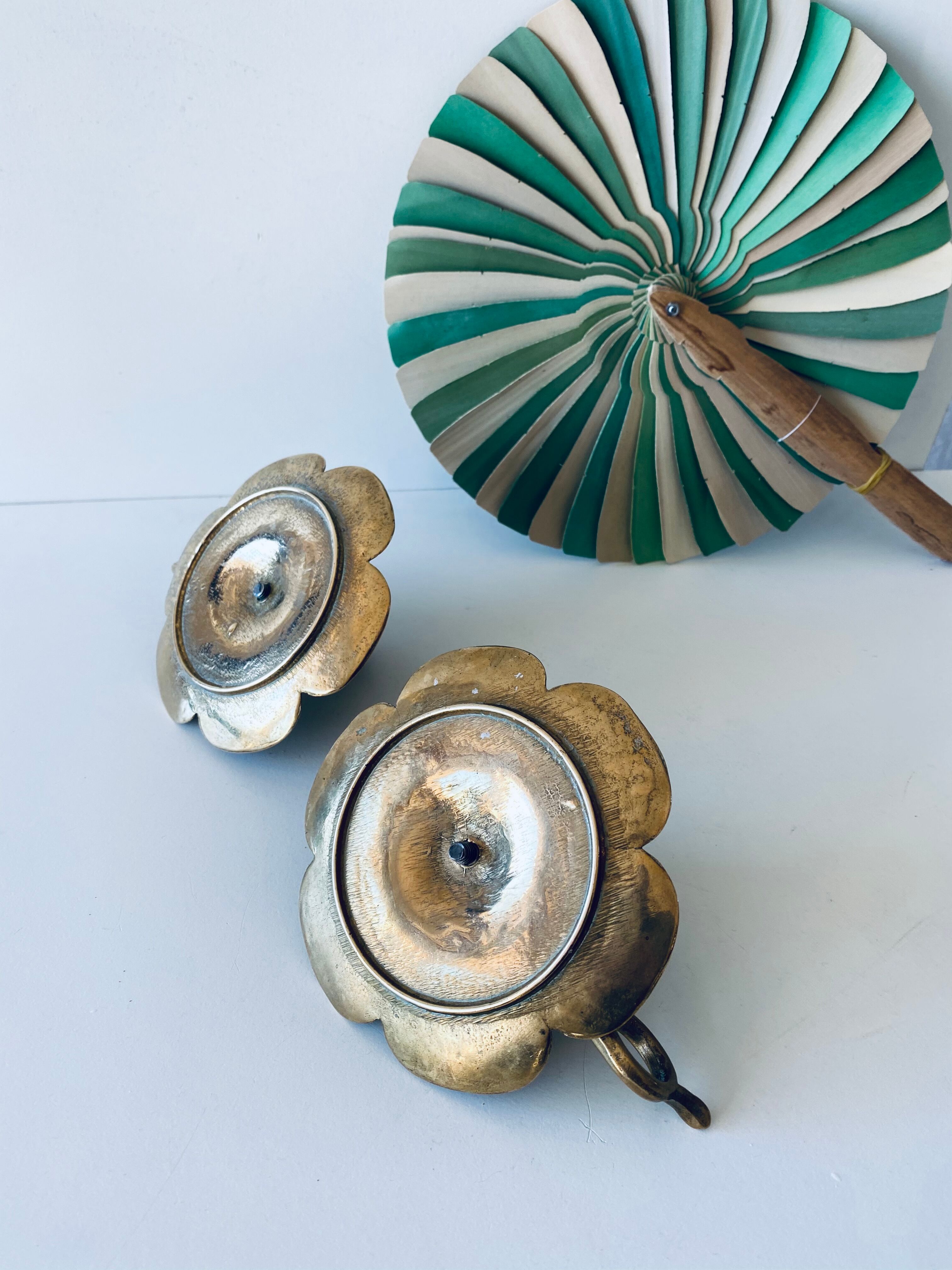Pair of brass clover candlesticks