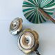 Pair of brass clover candlesticks