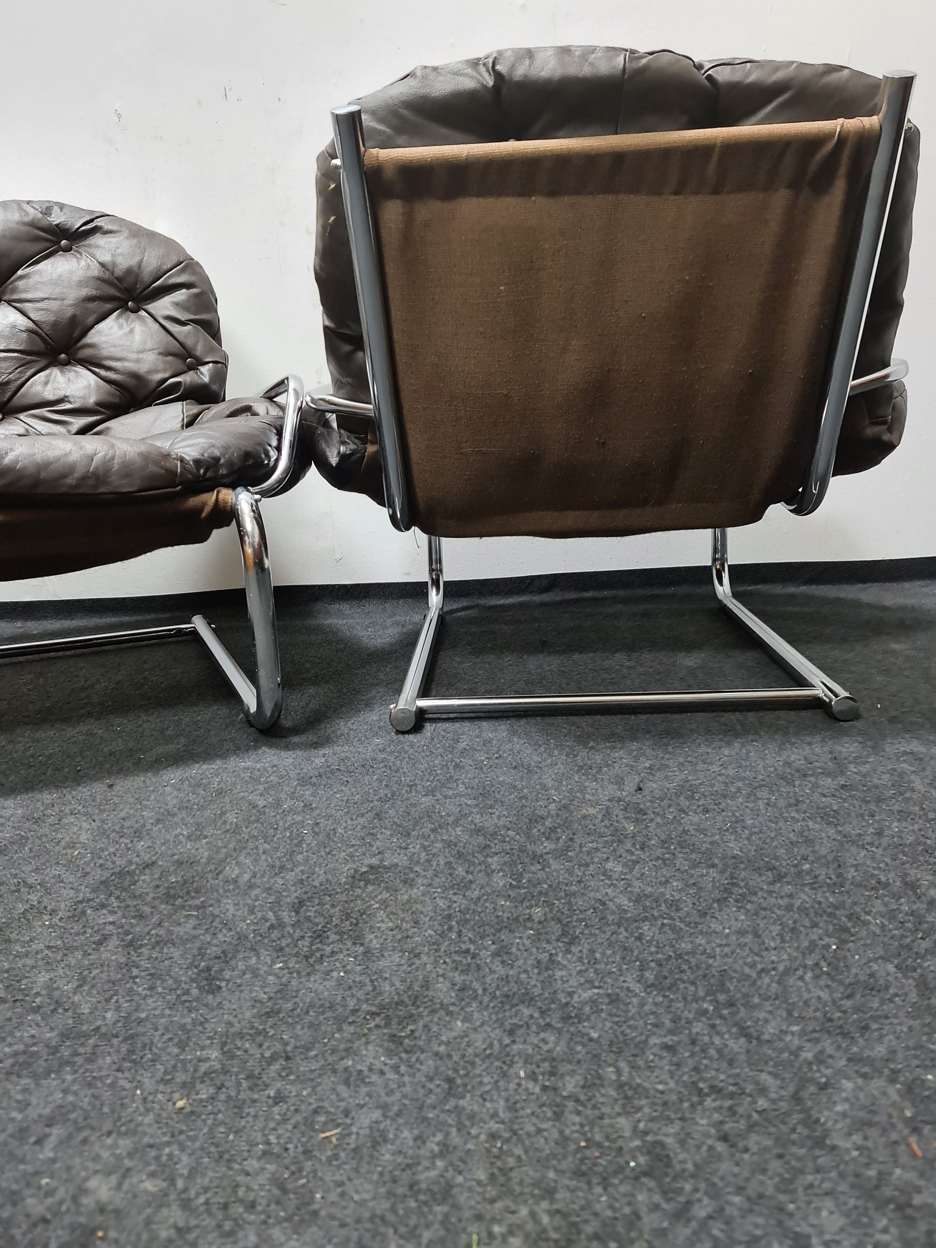 Pair of chrome and leather vintage chairs