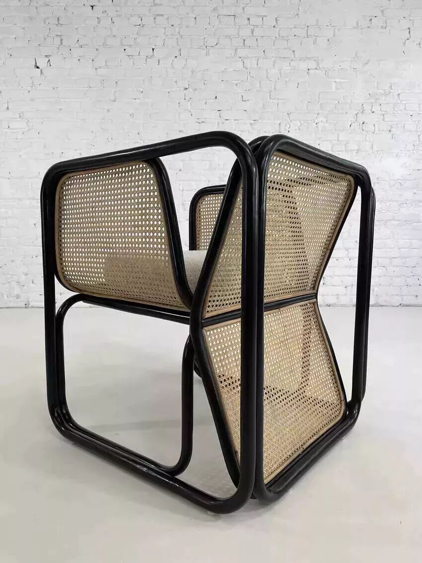 Cubic armchair in black rattan and canework