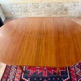 Expandable teak dining table, butterfly extension, circa 60s